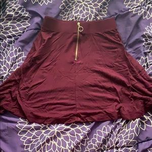 3 skirts (maroon, black, floral)